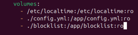 A terminal showing modified volumes: section in the docker-compose.yml file.